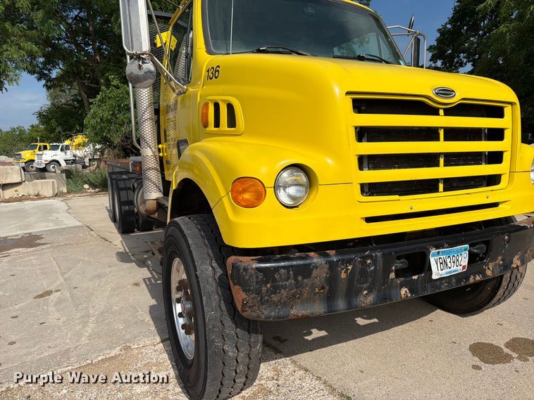image for item FK0253 1999 Sterling L7500 flatbed truck