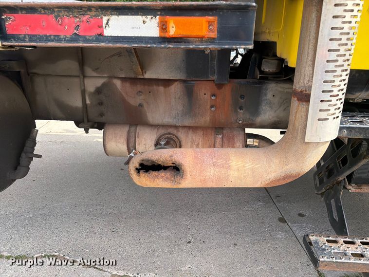 image for item FK0253 1999 Sterling L7500 flatbed truck
