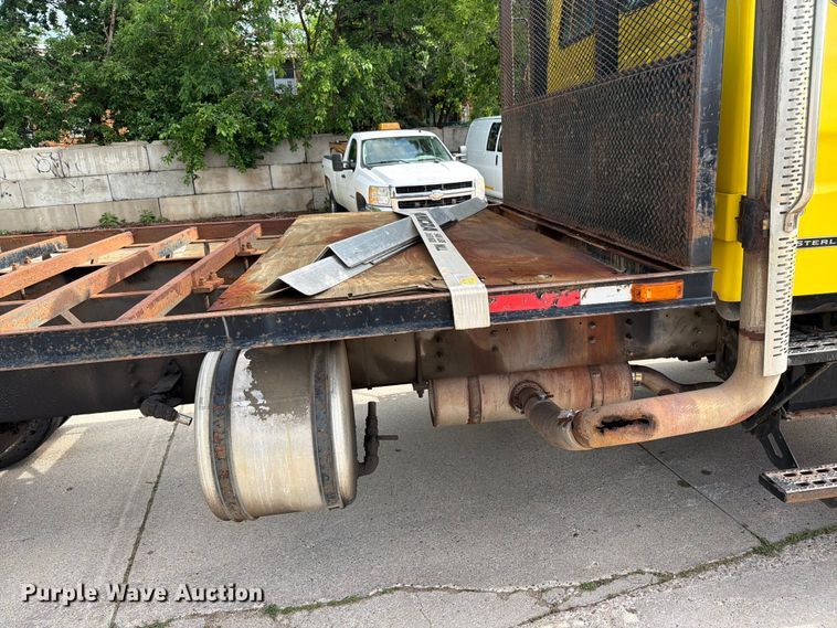image for item FK0253 1999 Sterling L7500 flatbed truck