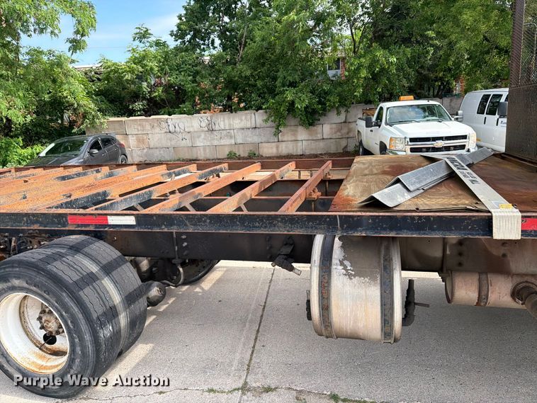 image for item FK0253 1999 Sterling L7500 flatbed truck