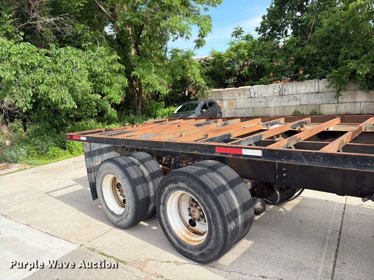 image for item FK0253 1999 Sterling L7500 flatbed truck