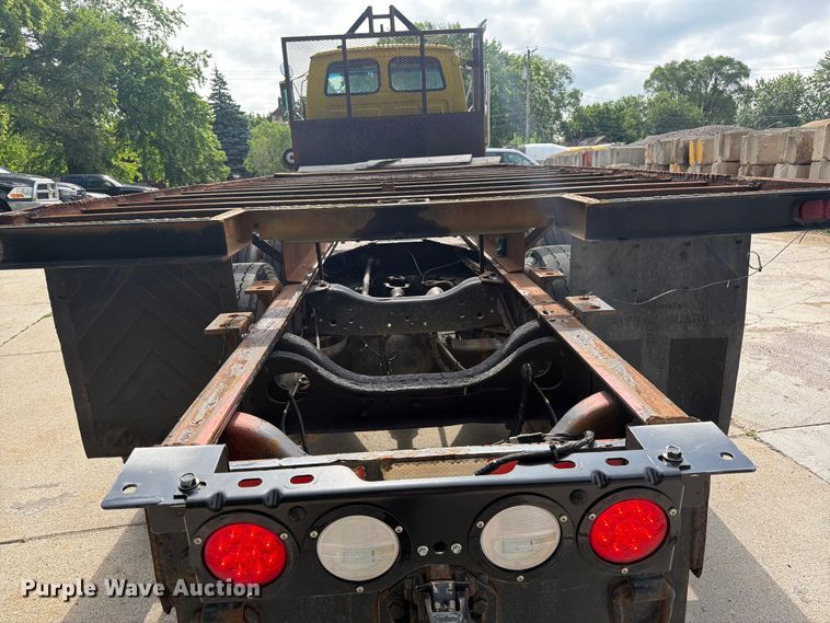 image for item FK0253 1999 Sterling L7500 flatbed truck