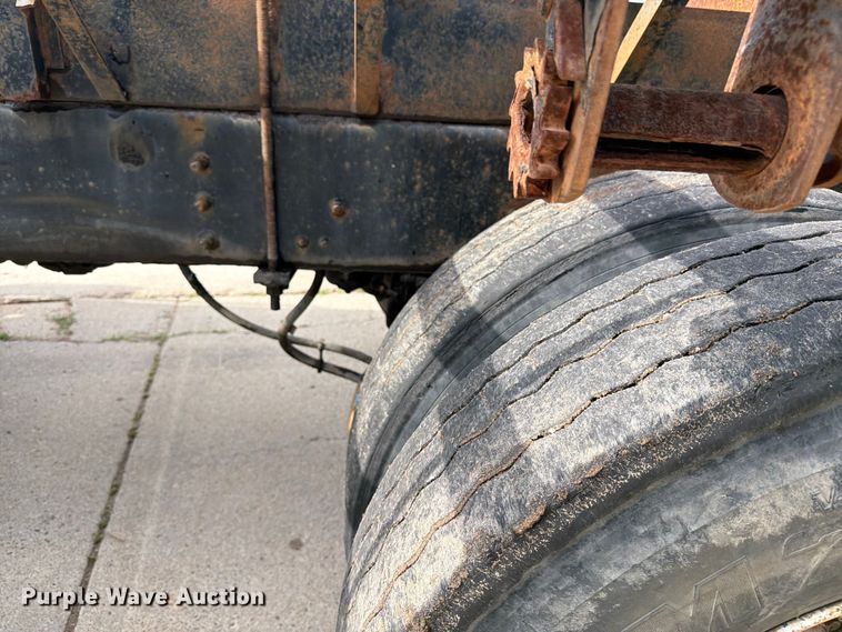 image for item FK0253 1999 Sterling L7500 flatbed truck