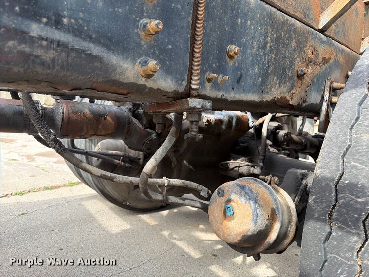 image for item FK0253 1999 Sterling L7500 flatbed truck