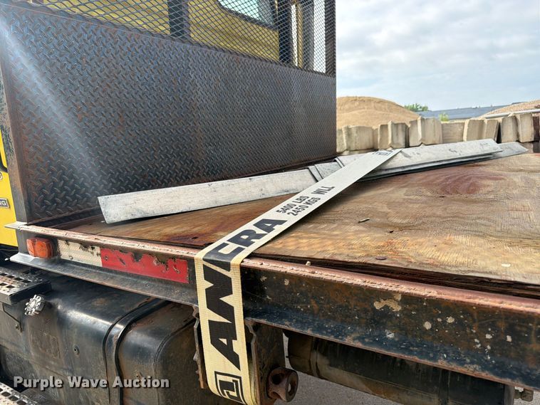 image for item FK0253 1999 Sterling L7500 flatbed truck