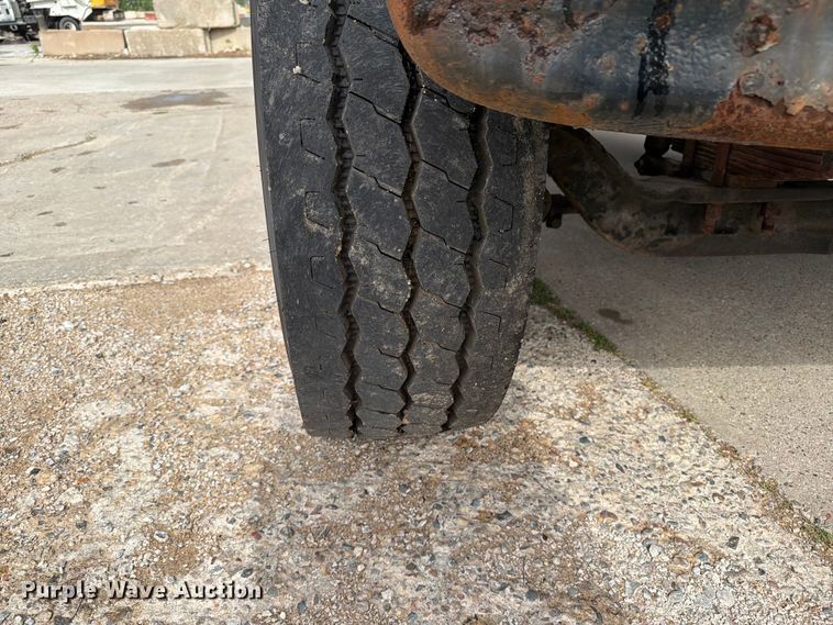 image for item FK0253 1999 Sterling L7500 flatbed truck