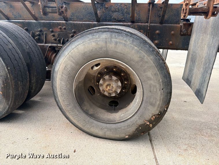 image for item FK0253 1999 Sterling L7500 flatbed truck
