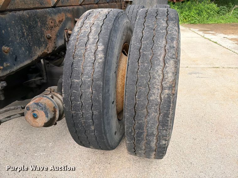 image for item FK0253 1999 Sterling L7500 flatbed truck