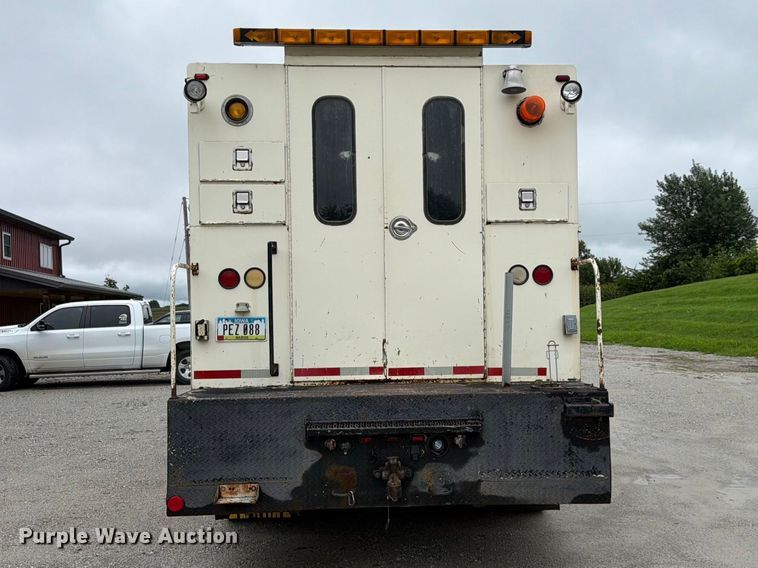 image for item FK3586 1999 Freightliner FL70 utility / service truck