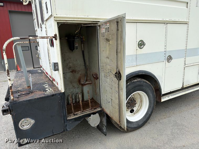 image for item FK3586 1999 Freightliner FL70 utility / service truck