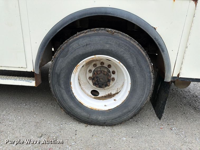 image for item FK3586 1999 Freightliner FL70 utility / service truck