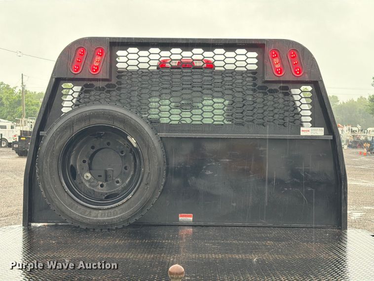 image for item EG9226 2022 Chevrolet C5500 Crew Cab flatbed truck