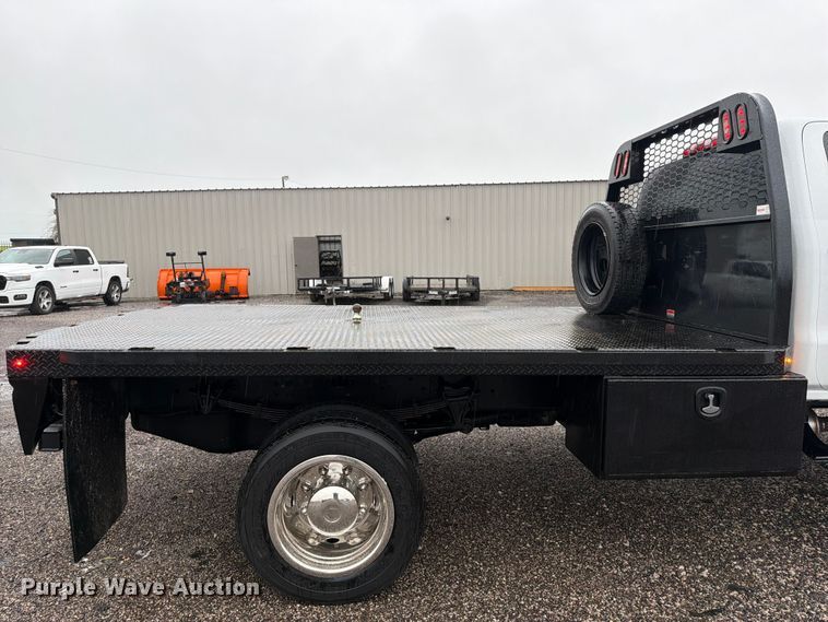 image for item EG9226 2022 Chevrolet C5500 Crew Cab flatbed truck