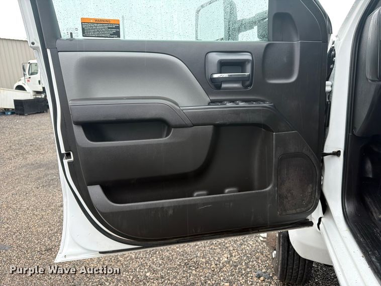 image for item EG9226 2022 Chevrolet C5500 Crew Cab flatbed truck