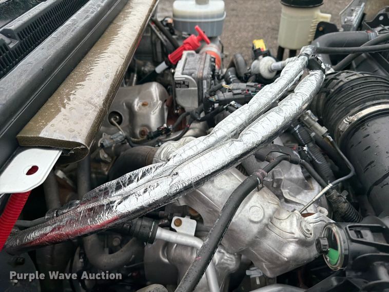 image for item EG9226 2022 Chevrolet C5500 Crew Cab flatbed truck