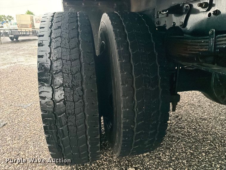image for item EG9226 2022 Chevrolet C5500 Crew Cab flatbed truck