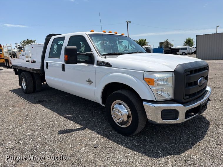 image for item EG9299 2015 Ford F350 Super Duty Crew Cab flatbed pickup truck