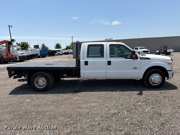 image for item EG9299 2015 Ford F350 Super Duty Crew Cab flatbed pickup truck
