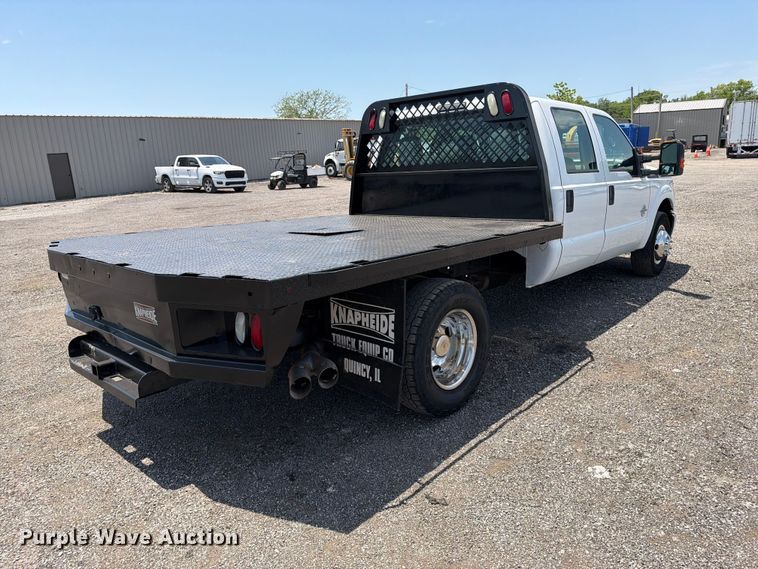 image for item EG9299 2015 Ford F350 Super Duty Crew Cab flatbed pickup truck