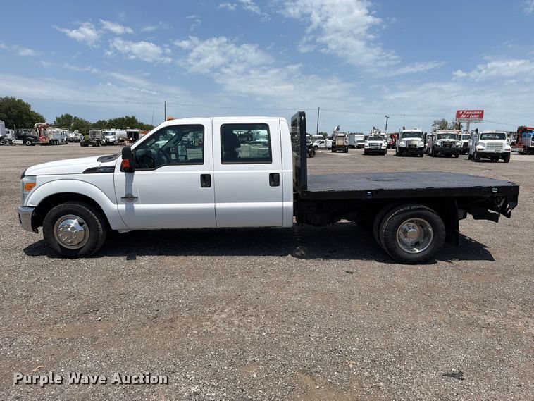 image for item EG9299 2015 Ford F350 Super Duty Crew Cab flatbed pickup truck