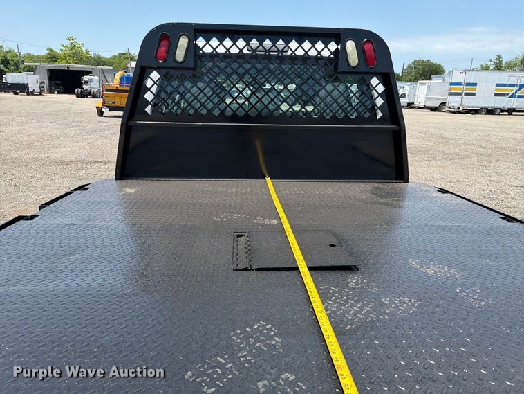 image for item EG9299 2015 Ford F350 Super Duty Crew Cab flatbed pickup truck