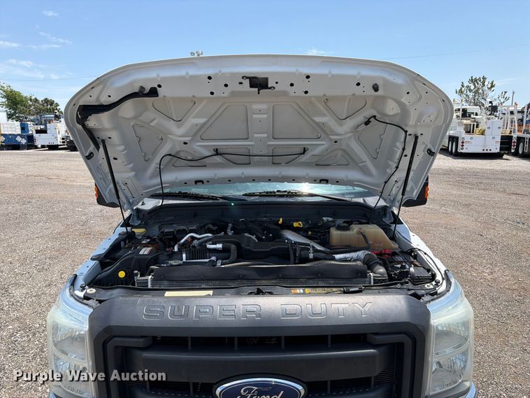 image for item EG9299 2015 Ford F350 Super Duty Crew Cab flatbed pickup truck