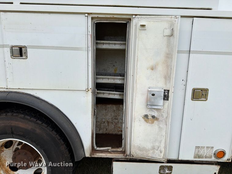 image for item EW8642 2005 GMC C7500 Crew Cab utility / service truck