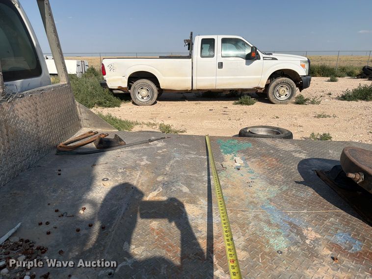 image for item EW8666 2015 Ford F550 Super Duty XL flatbed truck