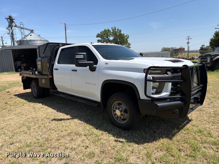 image for item EW8733 2022 Chevrolet Silverado 3500HD Crew Cab flatbed pickup truck