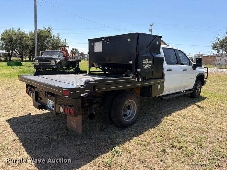 image for item EW8733 2022 Chevrolet Silverado 3500HD Crew Cab flatbed pickup truck