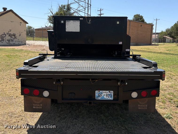 image for item EW8733 2022 Chevrolet Silverado 3500HD Crew Cab flatbed pickup truck