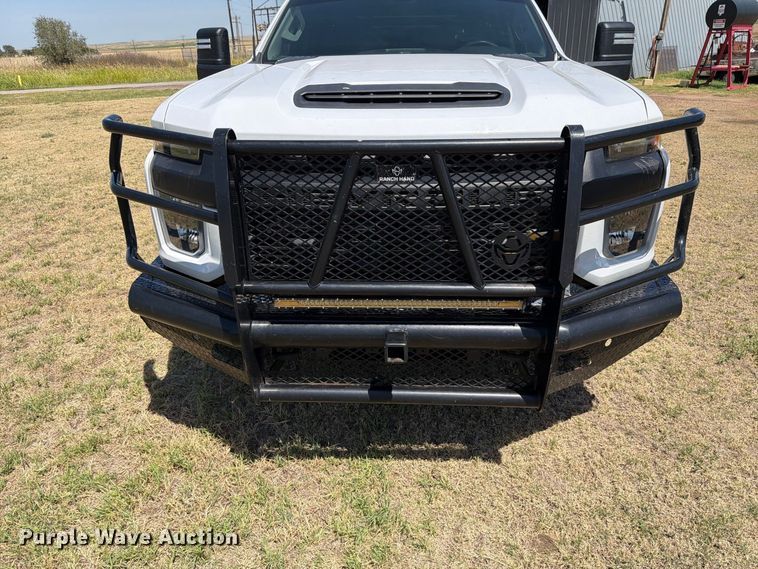 image for item EW8733 2022 Chevrolet Silverado 3500HD Crew Cab flatbed pickup truck