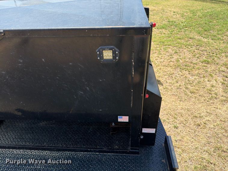 image for item EW8733 2022 Chevrolet Silverado 3500HD Crew Cab flatbed pickup truck