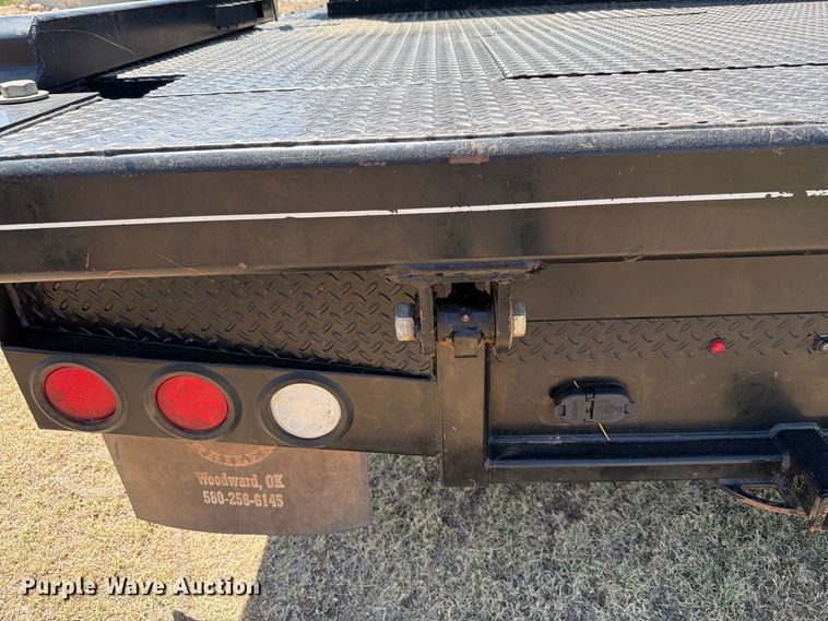 image for item EW8733 2022 Chevrolet Silverado 3500HD Crew Cab flatbed pickup truck