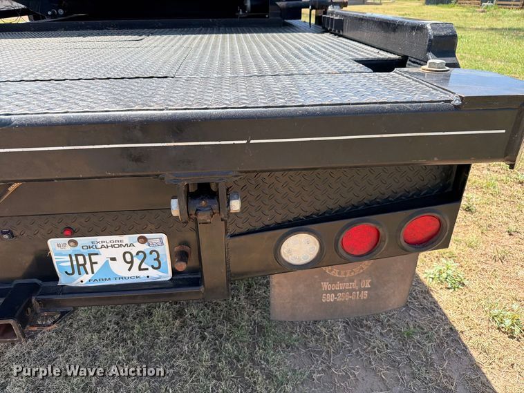 image for item EW8733 2022 Chevrolet Silverado 3500HD Crew Cab flatbed pickup truck
