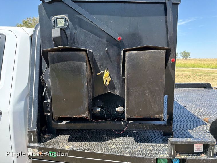 image for item EW8733 2022 Chevrolet Silverado 3500HD Crew Cab flatbed pickup truck