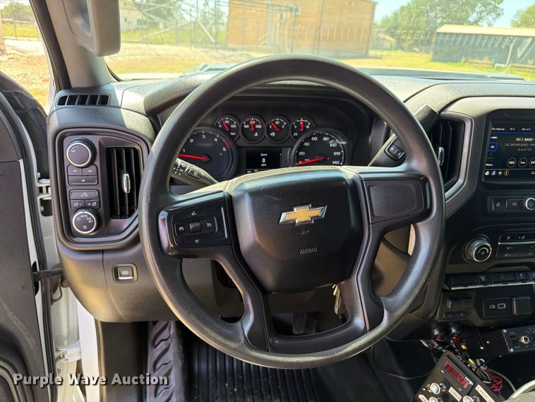 image for item EW8733 2022 Chevrolet Silverado 3500HD Crew Cab flatbed pickup truck