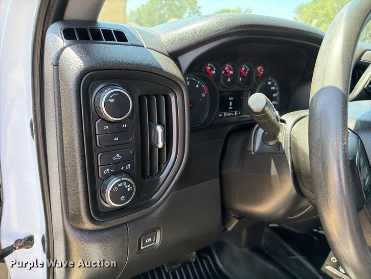 image for item EW8733 2022 Chevrolet Silverado 3500HD Crew Cab flatbed pickup truck