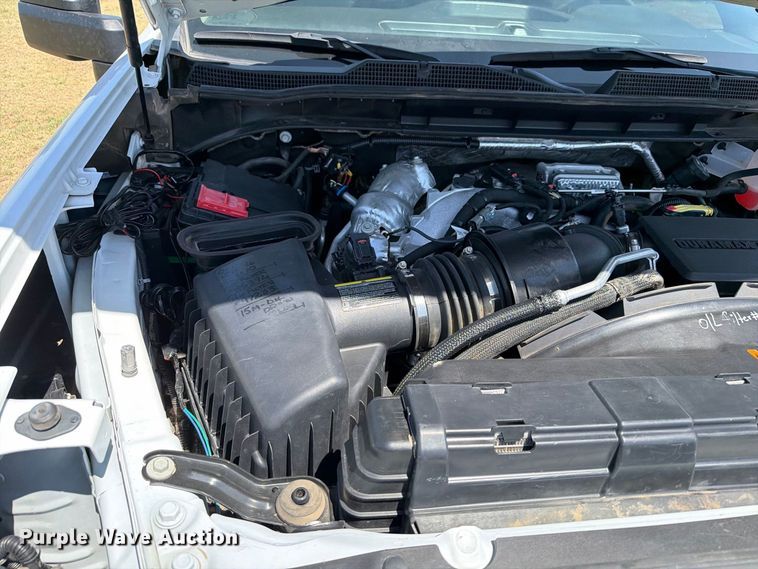 image for item EW8733 2022 Chevrolet Silverado 3500HD Crew Cab flatbed pickup truck