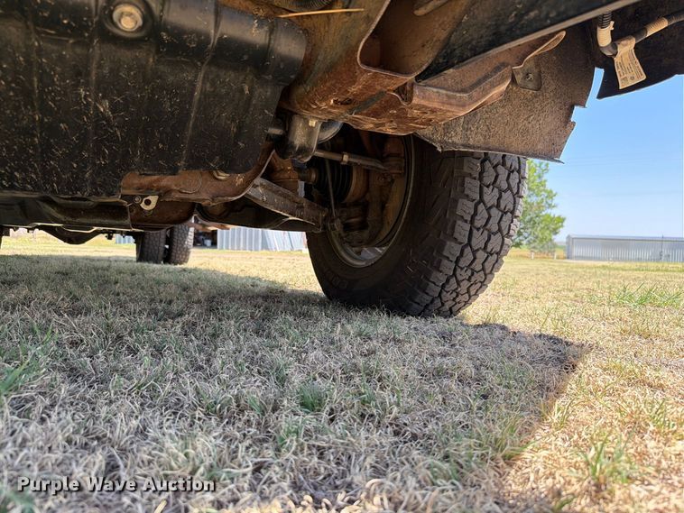 image for item EW8733 2022 Chevrolet Silverado 3500HD Crew Cab flatbed pickup truck