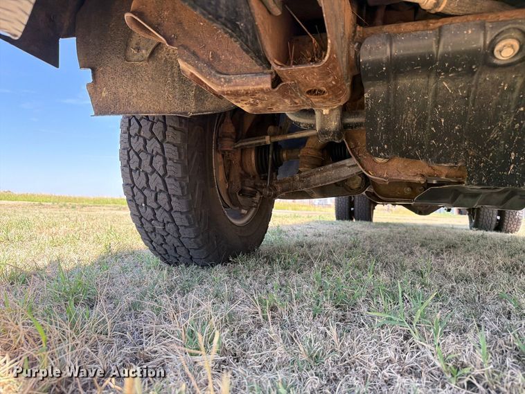 image for item EW8733 2022 Chevrolet Silverado 3500HD Crew Cab flatbed pickup truck