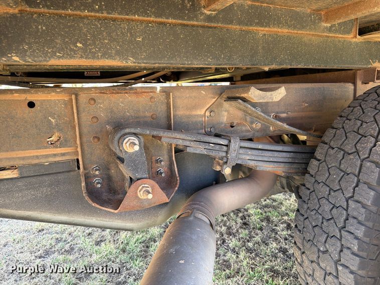 image for item EW8733 2022 Chevrolet Silverado 3500HD Crew Cab flatbed pickup truck
