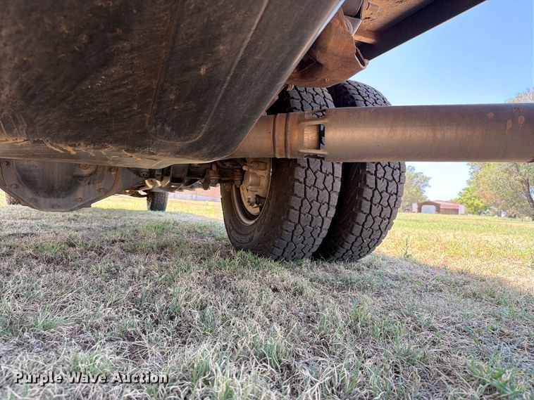 image for item EW8733 2022 Chevrolet Silverado 3500HD Crew Cab flatbed pickup truck