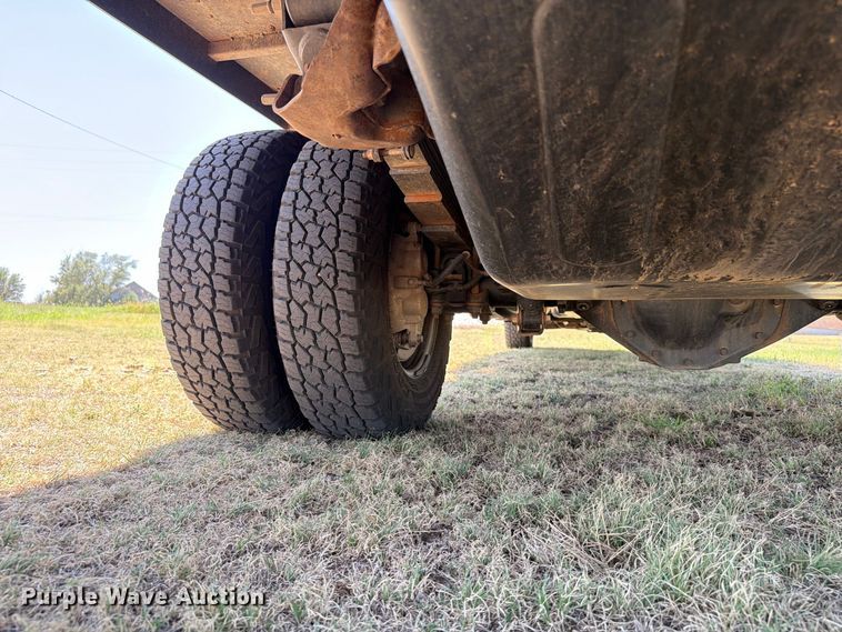 image for item EW8733 2022 Chevrolet Silverado 3500HD Crew Cab flatbed pickup truck