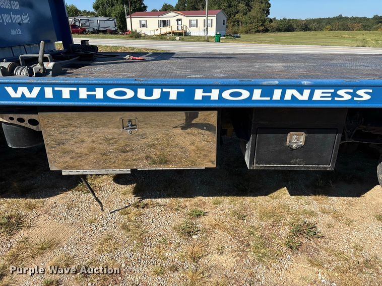image for item FG0614 2008 Ford  F650 Super Duty XLT Pro Loader rollback truck