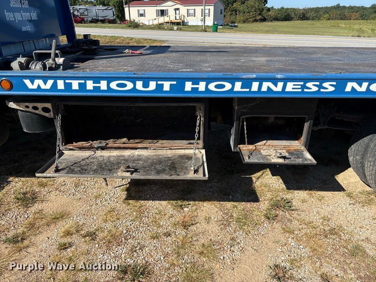 image for item FG0614 2008 Ford  F650 Super Duty XLT Pro Loader rollback truck