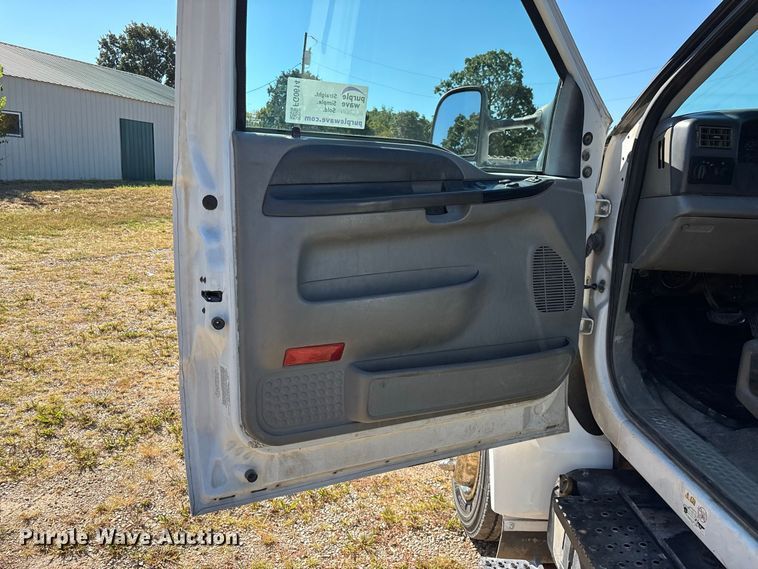 image for item FG0614 2008 Ford  F650 Super Duty XLT Pro Loader rollback truck
