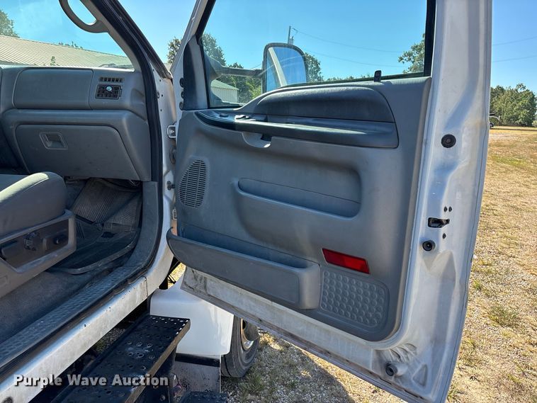 image for item FG0614 2008 Ford  F650 Super Duty XLT Pro Loader rollback truck