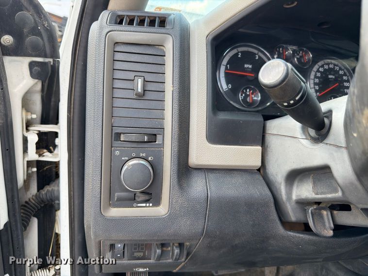 image for item FK3409 2012 Dodge  Ram 3500HD Crew Cab flatbed pickup truck
