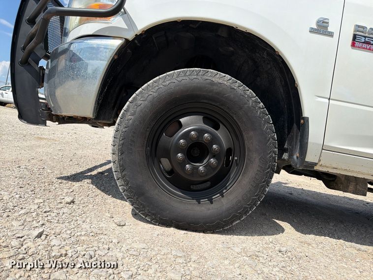 image for item FK3409 2012 Dodge  Ram 3500HD Crew Cab flatbed pickup truck